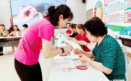 中法城恒大社区：非遗缠花传母爱 巾帼巧手织温情